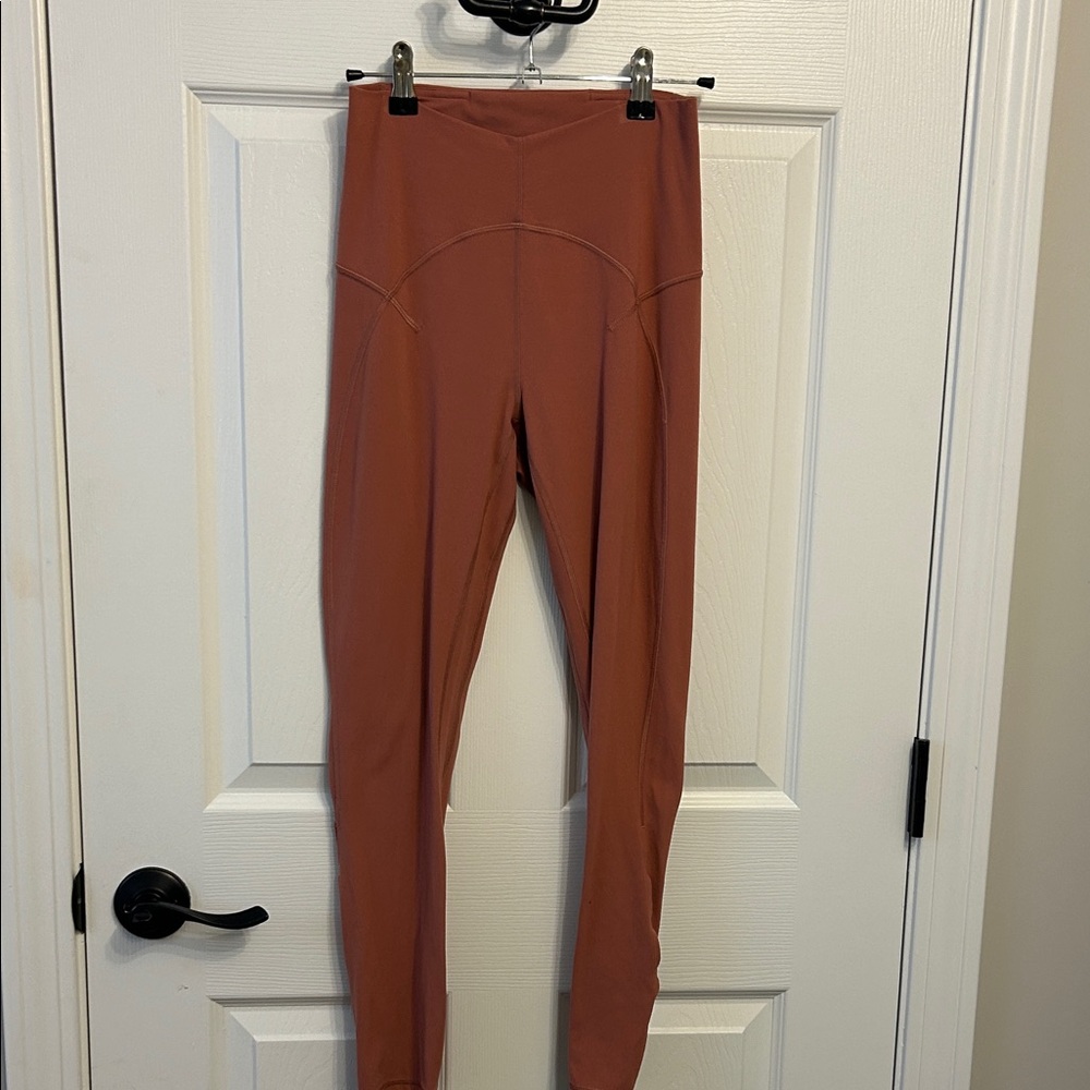 Lululemon 25” align pants. Dusty rose color. Size 6. Super rare detail on leg.